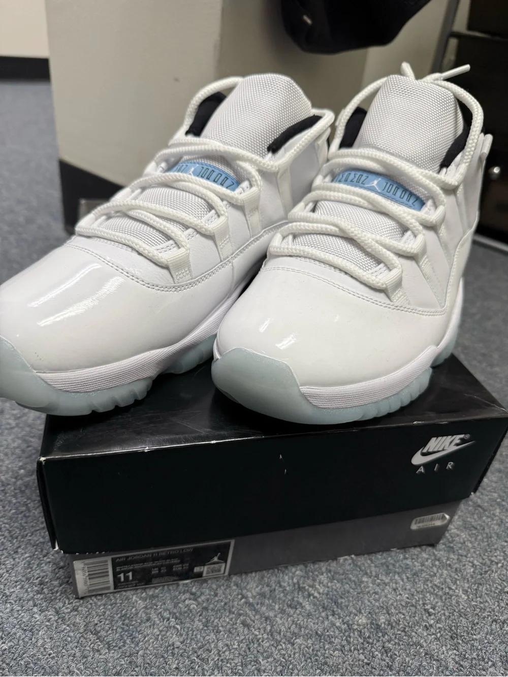Jordan Men's White and Black Athletic Shoes with Ice Blue Accents - Picture 8 of 10